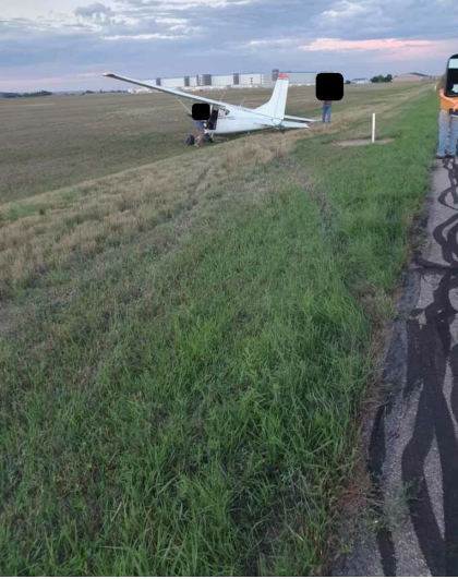 Photograph 3 – View of the rear of the airplane at the accident site, from the NTSB investigation of Cessna A185 accident near Loveland, Colorado, August 20, 2024