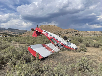 Photograph 3 – Accident site, airplane left side, from the NTSB investigation of Bellanca 7GCAA accident near Rifle, Colorado, September 8, 2024