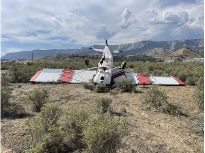 Photograph 5 – Accident site, airplane bottom side, from the NTSB investigation of Bellanca 7GCAA accident near Rifle, Colorado, September 8, 2024