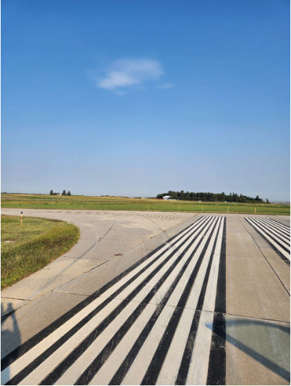 Photograph 6 – Skid marks, from the NTSB investigation of Diamond DA42 accident near Mandan, North Dakota, September 1, 2024