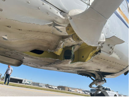 Photograph 2 – Damage to right side of fuselage (FAA Photo), from the NTSB investigation of Cessna 172R accident near Lincoln, Nebraska, September 20, 2024