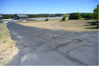 Photograph 3 – Impact marks on ground, from the NTSB investigation of Cirrus Design CORP SR22 accident near Lakeway, Texas, September 25, 2024