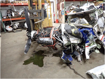 Photograph 3 – Engine, Left Side, from the NTSB investigation of Cessna 182T accident near Drake, Colorado, November 23, 2024