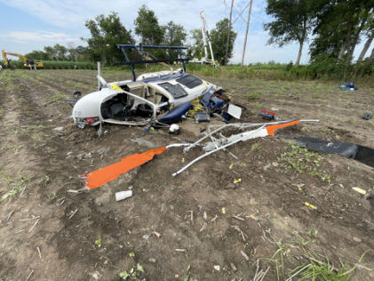 Photograph 2 – Fuselage / main rotor blades at accident site (NTSB photo), from the NTSB investigation of Bell Helicopter Textron 206L-1 accident near Thibodaux, Louisiana, July 23, 2025