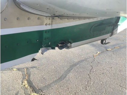 Photograph 2 – Fuselage Substantial Damage, from the NTSB investigation of Cessna 172P accident near Falcon, Colorado, October 24, 2024