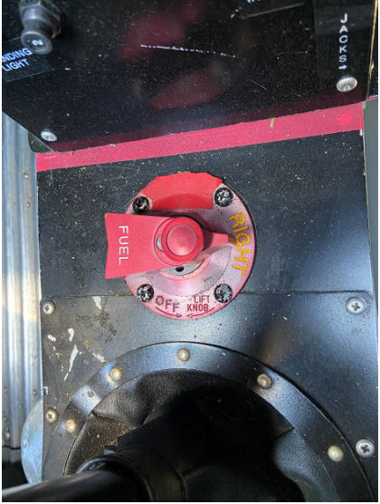 Photograph 3 – Fuel Selector Position at Accident Site, from the NTSB investigation of Amateur-built DHC-1 accident near East Troy, Wisconsin, November 6, 2024