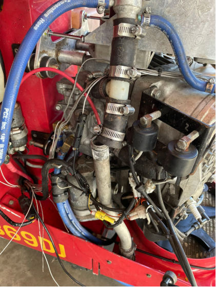 Photograph 3 – Engine Coolant Hose (NTSB Photo), from the NTSB investigation of Amateur-built Mosquito XE accident near Waco, Texas, November 11, 2024