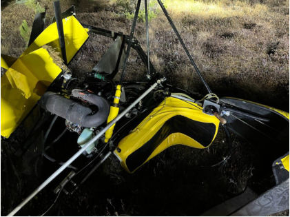Photograph 1 – View of the fuselage and the engine at the accident site, from the NTSB investigation of Amateur-built Dominator accident near Gilbert, Minnesota, November 15, 2024
