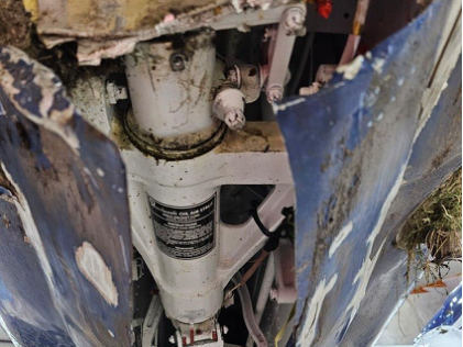 Photograph 4 – Nose Landing Gear (Park Rapids Aviation), from the NTSB investigation of Beech 58TC accident near International Falls, Minnesota, October 20, 2024