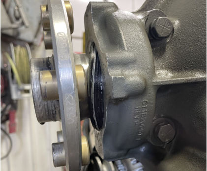 PG 4 Photograph 3 – Extruded crankshaft oil seal, from the NTSB investigation of Piper PA-28R-200 accident near Boscobel, Wisconsin, December 2, 2024