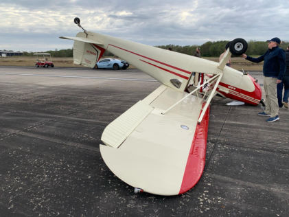 Photo 3 – Airplane at accident site, left side, from the NTSB investigation of Cessna 140 accident near Pearland, Texas, November 30, 2024