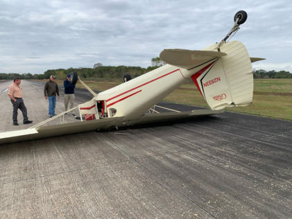 Photo 4 – Airplane at accident site, aft, from the NTSB investigation of Cessna 140 accident near Pearland, Texas, November 30, 2024