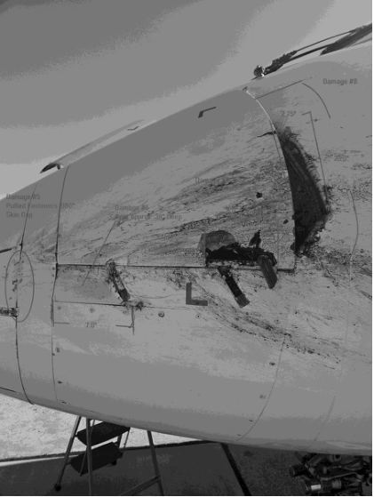 Photograph 4 – Left Side of Forward Fuselage (Operator Photo), from the NTSB investigation of Bombardier INC CL-600-2B19 accident near Stringtown, Mississippi, January 3, 2025