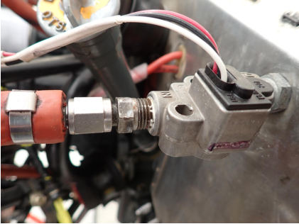 Photograph 3 – Fuel Flow Transducer Attachment Fittings, from the NTSB investigation of Piper Aircraft INC PA-28-181 accident near Addison, Texas, January 15, 2025