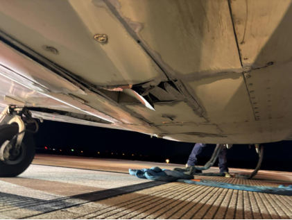 Photograph 2 – Underside of fuselage, from the NTSB investigation of Piper PA-24-250 accident near Tyler, Texas, January 15, 2025