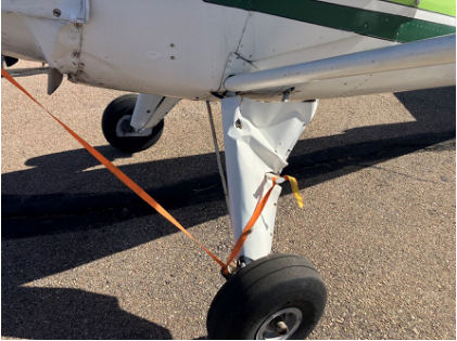 PG 4 Photograph 3 – Left main landing gear after recovery, from the NTSB investigation of Luscombe 8E accident near Brush, Colorado, January 27, 2025
