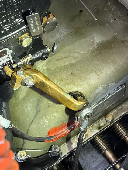 Photograph 2 – Throttle Arm and Cable End, from the NTSB investigation of Cessna 180 accident near Breckenridge, Texas, February 17, 2025