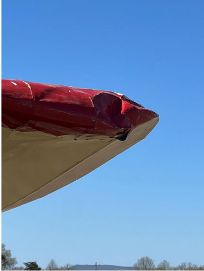 Photograph 10 – View of the substantial damage sustained to the left wing of N39158 Taylorcraft BC-12D, from the NTSB investigation of Taylorcraft BC12 accident near Russellville, Arkansas, March 22, 2025