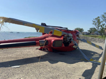 Photograph 2 – Helicopter at Accident Site (FAA Photo), from the NTSB investigation of Airbus Helicopters EC130 accident near Clay Township, Michigan, June 22, 2025