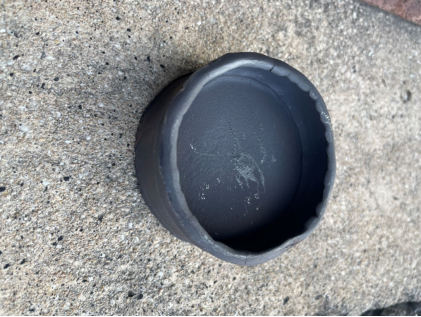 Photograph 4 – Steel baffle plate removed from tailpipe (NTSB Photo), from the NTSB investigation of Tecnam P2010 accident near Temple, Texas, June 26, 2025