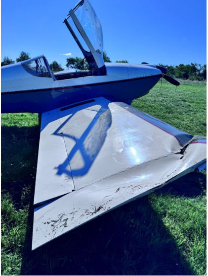 Photograph 2 – Right side view of the airplane after it was recovered from the water, from the NTSB investigation of Van'S Aircraft RV-6 accident near New Richmond, Wisconsin, July 17, 2025
