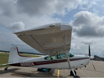 Photograph 1 – Accident airplane, from the NTSB investigation of Cessna A185F accident near Lansing, Michigan, July 19, 2025