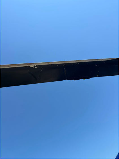 Photograph 1 – Damage to helicopter’s main rotor blade, from the NTSB investigation of Bell 206B accident near North Bend, Nebraska, July 27, 2025