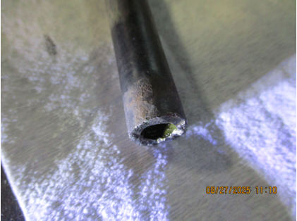 Photograph 9 - No. 2 exhaust valve stem, from the NTSB investigation of Piper PA-18-150 accident near Joliet, Illinois, August 14, 2025