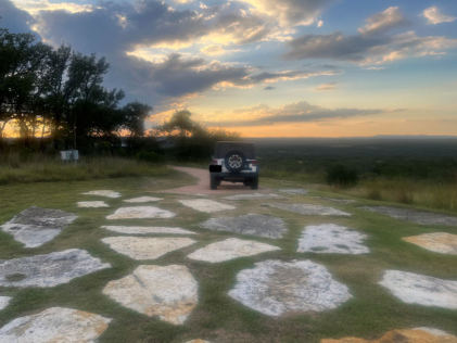 Photograph 10 – View from the private heliport looking to the northwest, from the NTSB investigation of Sikorsky Aircraft CORP S-76 accident near Round Mountain, Texas, September 1, 2025