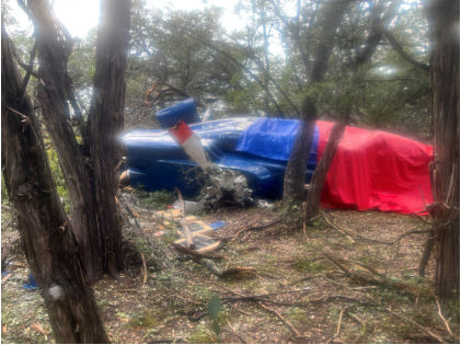 Photograph 4 – View of the fuselage at the accident site, from the NTSB investigation of Sikorsky Aircraft CORP S-76 accident near Round Mountain, Texas, September 1, 2025