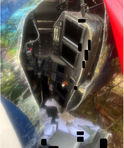 Photograph 6 – View of the cockpit at the accident site, from the NTSB investigation of Sikorsky Aircraft CORP S-76 accident near Round Mountain, Texas, September 1, 2025