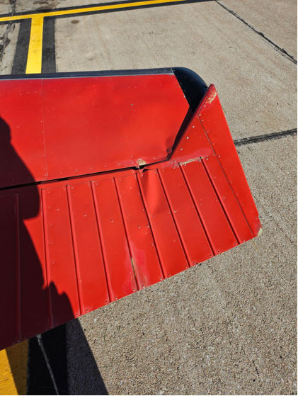 Photograph 2 – Right horizontal stabilizer and elevator after the accident, from the NTSB investigation of Cessna 180H accident near Omaha, Nebraska, September 13, 2025