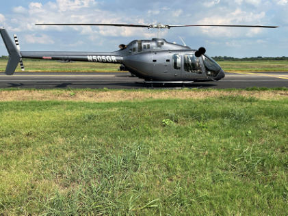 Photograph 4 – View of the right side of the helicopter at the heliport, from the NTSB investigation of Bell Helicopter Textron Canada 505 accident near Fort Worth, Texas, August 27, 2025