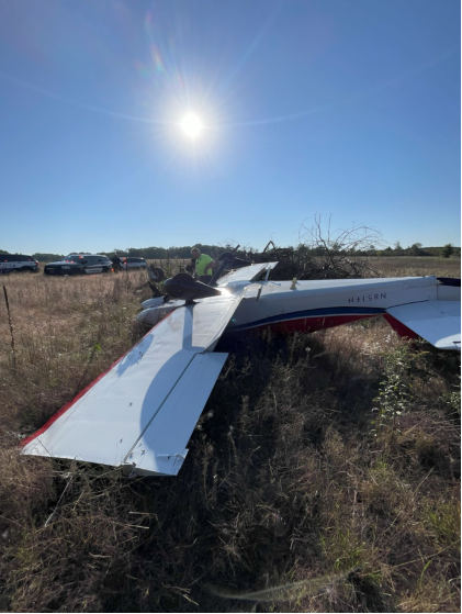 Photograph 2 – Side view of airplane at accident site, from the NTSB investigation of Amateur-built RV-6 accident near Cambridge, Minnesota, September 25, 2025