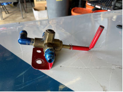 Photograph 4 – Fuel selector valve after removal from aircraft, from the NTSB investigation of Amateur-built RV-6 accident near Cambridge, Minnesota, September 25, 2025