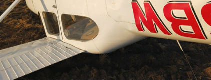 Photograph 1 – Empennage Damage, from the NTSB investigation of Quartz Mountain Aerospace INC 11E accident near Earlham, Iowa, October 1, 2025