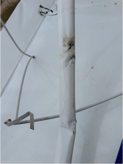 Photograph 5 – Bent wing strut, from the NTSB investigation of Amateur-built Highlander accident near Brazos, Texas, November 27, 2025