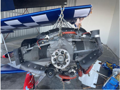Photograph 3 – Engine with cowling removed, from the NTSB investigation of Pitts S1S accident near Carbondale, Illinois, December 31, 2025
