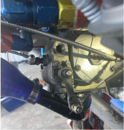 Photograph 6 – Position of mixture arm with fuel screen removed, from the NTSB investigation of Pitts S1S accident near Carbondale, Illinois, December 31, 2025