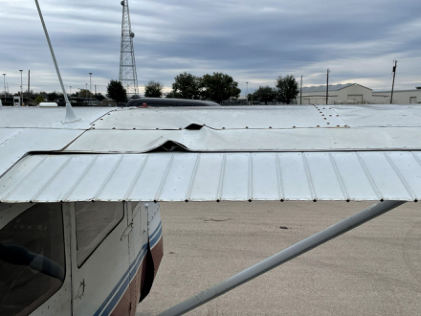 Photograph 4 – View of the substantial damage sustained to the right wing, from the NTSB investigation of Cessna 172 accident near Taylor, Texas, December 26, 2025