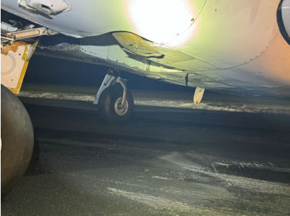 Photograph 3 – Belly damage on accident airplane, from the NTSB investigation of Piper PA24 accident near Bay City, Michigan, January 8, 2026