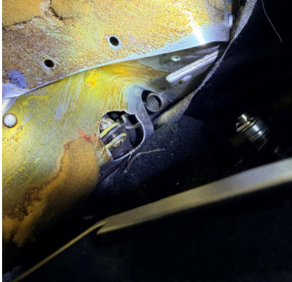 Photograph 3 – View of the substantial damage sustained to the lower fuselage near the cockpit, from the NTSB investigation of Cessna 172 accident near San Marcos, Texas, January 7, 2026