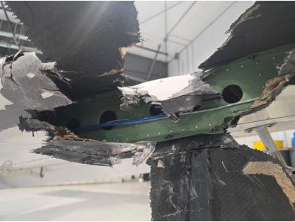 Photograph 4 – Left wing spar damage, from the NTSB investigation of Costruzioni Aeronautiche Tecna P-MENTOR accident near Des Moines, Iowa, February 11, 2026