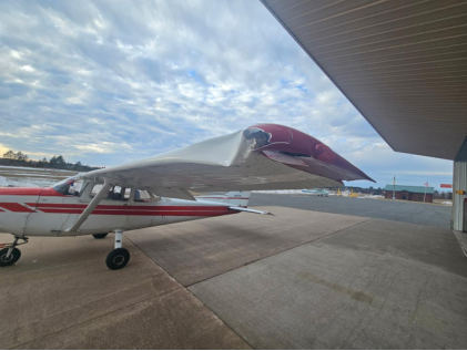 Photograph 2 – Airplane Left wing damage, from the NTSB investigation of Cessna 172M accident near Solon Springs, Wisconsin, March 9, 2026