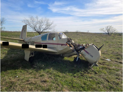 Photograph 1 – View of the front of the airplane at the accident site, from the NTSB investigation of Mooney M20 accident near Northlake, Texas, March 18, 2026