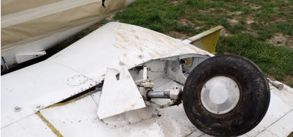 Photograph 2 – Right wing as removed for transport showing wing spar damage, from the NTSB investigation of Piper PA-24-250 accident near Madison, Indiana, March 21, 2026