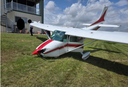 Photograph 2 – Front view and right-wing damage, from the NTSB investigation of Cessna 182 accident near Houston, Texas, April 1, 2026