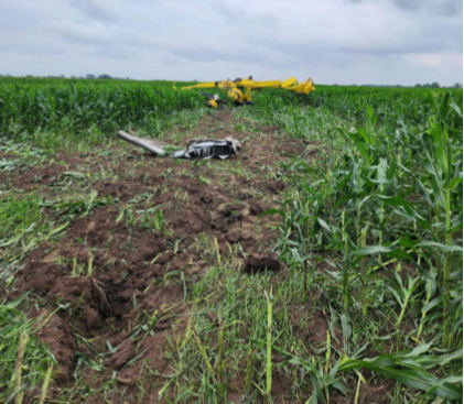 Photograph 1 – Ground scar and N422TW, from the NTSB investigation of Air Tractor INC AT-602 accident near El Campo, Texas, May 5, 2026