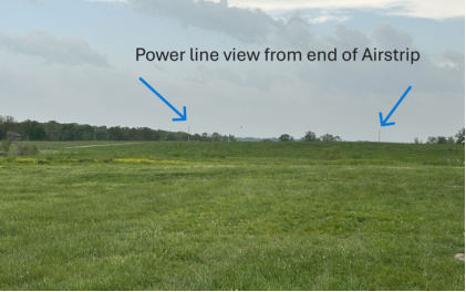Photograph 1 – Powerlines viewed from the end of the airstrip, from the NTSB investigation of Just Aircraft JA-30 accident near Hartville, Missouri, April 26, 2026