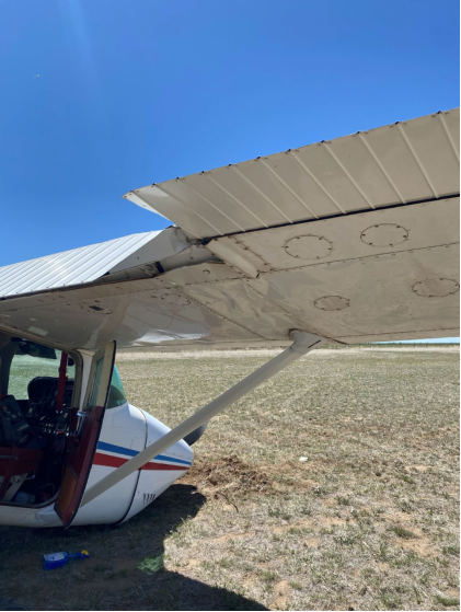 Photograph 2 – Right wing., from the NTSB investigation of Cessna 182P accident near Bennett, Colorado, May 11, 2026